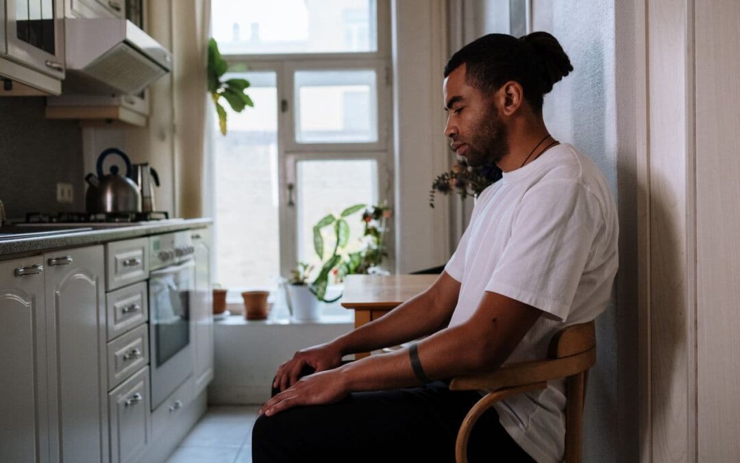man-relaxation-sitting-kitchen